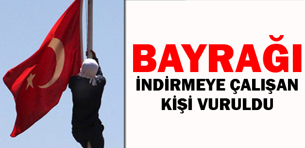 Polis merkezindeki bayrağı indirmeye çalışan kişi vuruldu