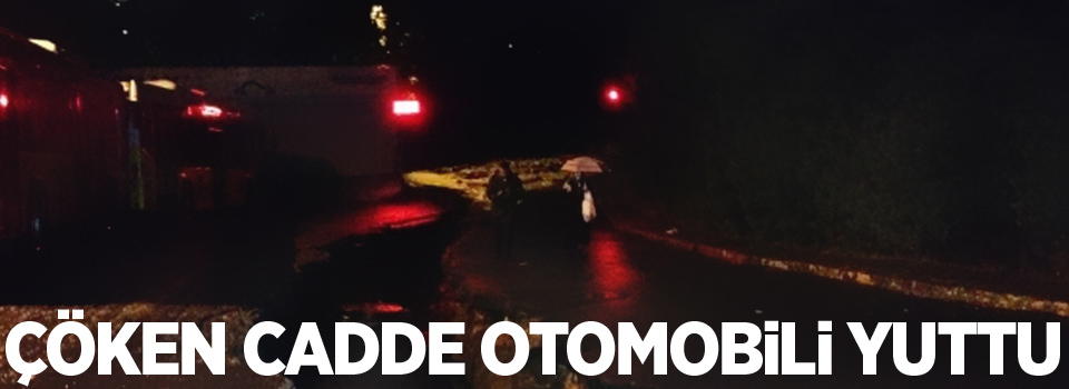 Çöken cadde otomobili yuttu