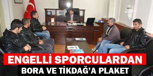 Engelli sporculardan Bora ve Tikdağ'a plaket