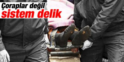 Günün karesi: Madencinin delik çorapları