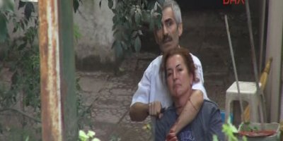 Araziye köpek gömen kadını rehin aldı
