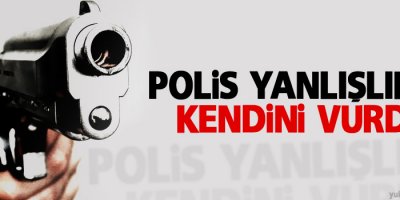 Polis yanlışlıkla kendini vurdu