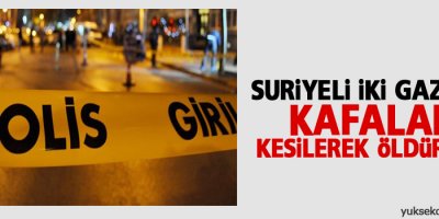 Suriyeli iki gazeteci kafaları kesilerek öldürüldü