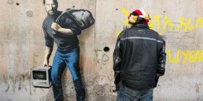 Banksy, mülteci kampında göçmen Steve Jobs'u çizdi