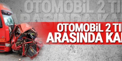 Otomobil iki TIR'ın arasında kaldı!