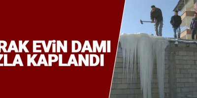 Toprak evin damı buzla kaplandı