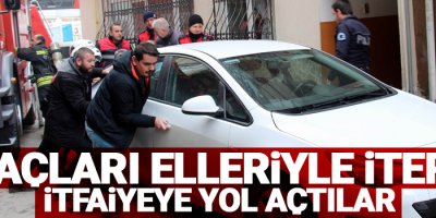 Araçları elleriyle iterek itfaiyeye yol açtılar