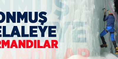 Donmuş şelaleye tırmandılar