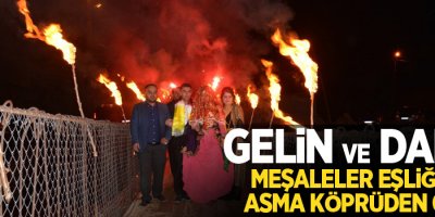 Gelin ve damat meşaleler eşliğinde asma köprüden geçti