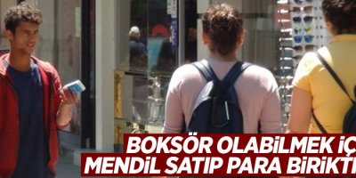 Boksör olabilmek için mendil satıp para biriktiriyor