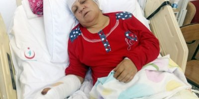 Sandalye yüzünden tartıştığı eşini baltayla darp etti