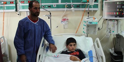 Oğlunu toprağa gömerek kurtardı