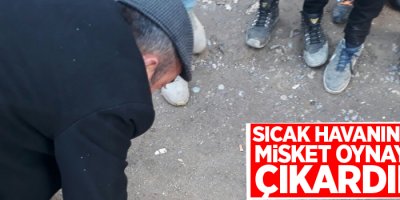 Sıcak havanın tadını misket oynayarak çıkardılar