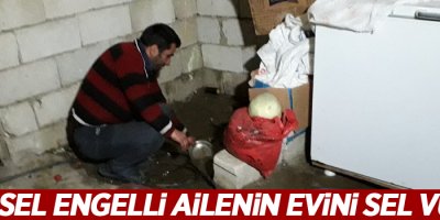 Zihinsel engelli ailenin evini sel vurdu