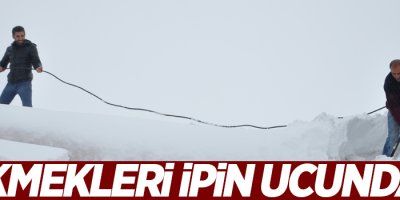Ekmekleri ipin ucunda
