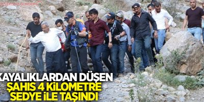 Kayalıklardan düşen şahıs 4 kilometre sedye ile taşındı