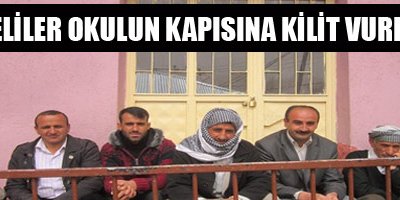Veliler okulun kapısına kilit vurdu
