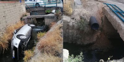 Van'da yoldan çıkan otomobil kanala uçtu